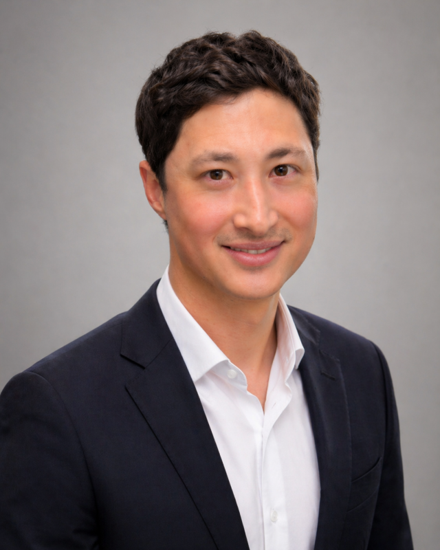 Portrait of Ross J. Miller, DMD in professional business attire